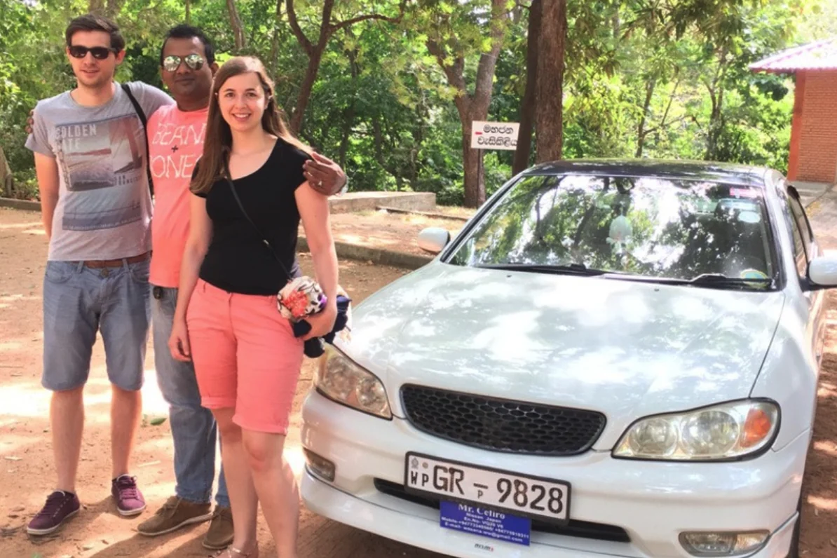 Couple travelling through Sri Lanka with their private driver and sedan