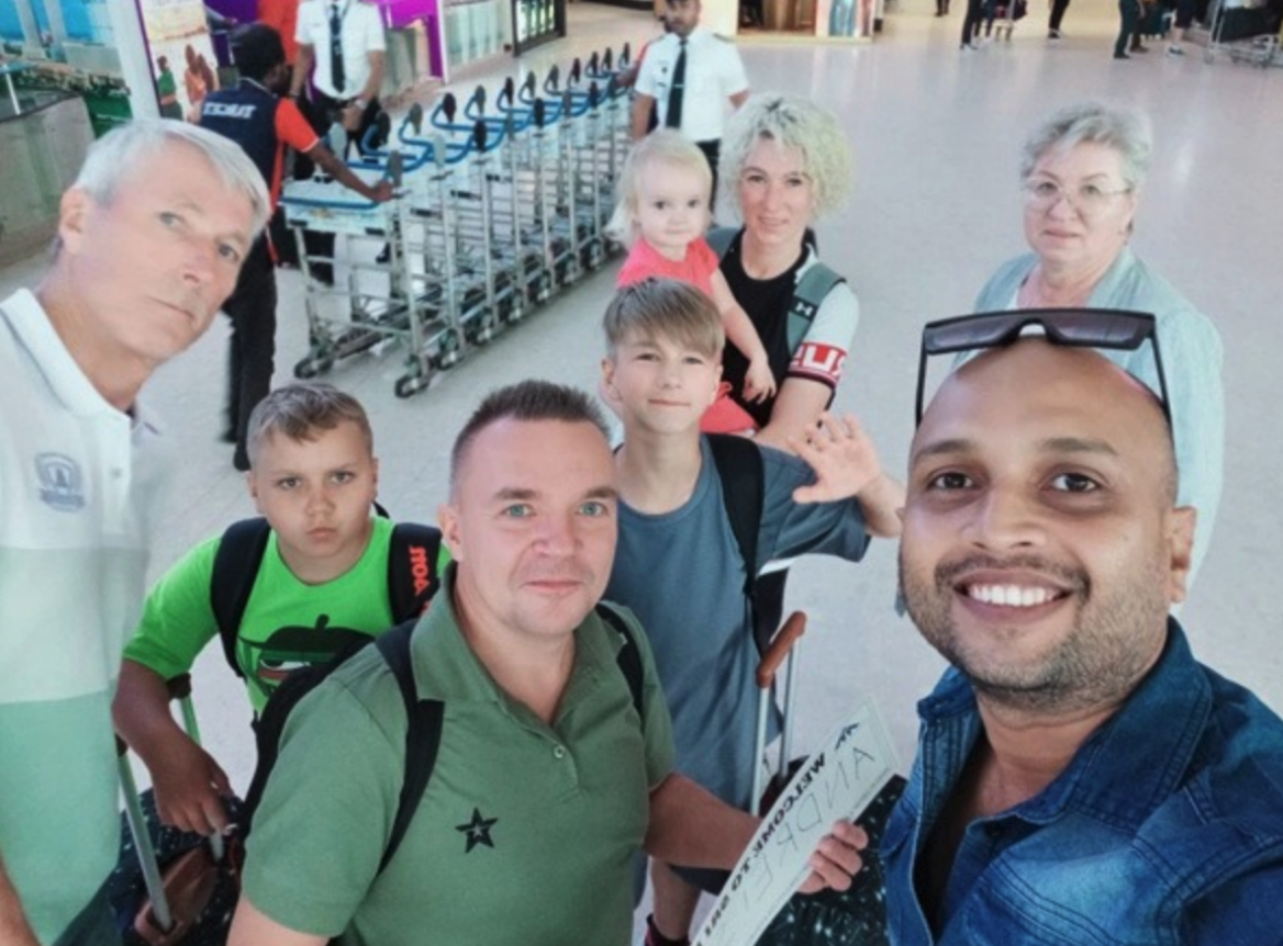 Travelers meeting their Sri Lankan driver at the airport for a private car journey